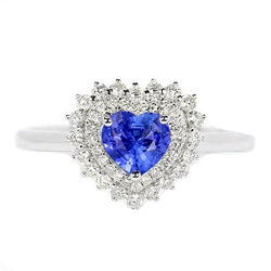 Bague en saphir bleu naturel avec halo de diamants. style étoile 3 carats
