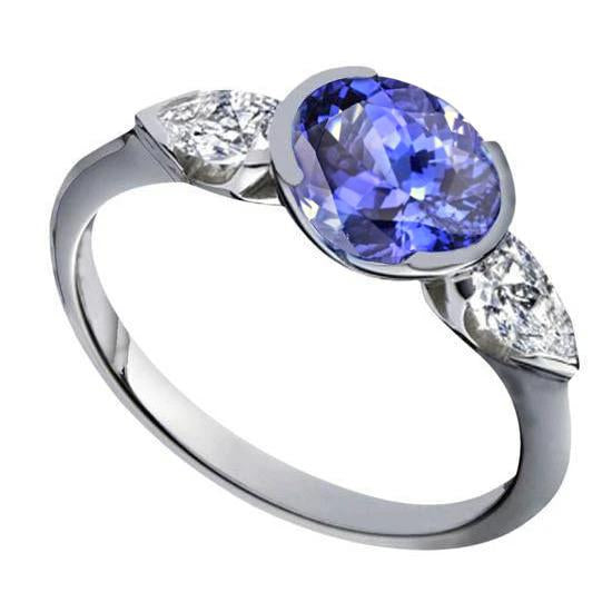 Bague étincelante en tanzanite ovale 3 carats et diamant poire 3 pierres - HarryChadEnt.FR
