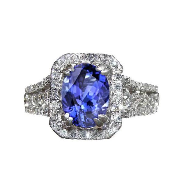 Bague ovale en tanzanite et pavé de diamants ronds 5.70 carats WG 14K - HarryChadEnt.FR
