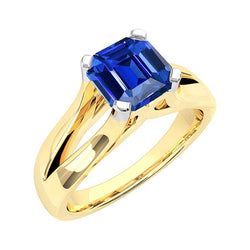 Bague saphir bleu émeraude solitaire à deux tons. tige fendue de 2.50 carats