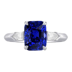 Bague saphir émeraude à trois pierres. diamant baguette conique de 3.50 carats