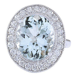 Bague sertie de griffes 11 carats aigue-marine ronde et diamants or blanc 14K