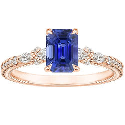 Bague sertie diamants en or rose et saphir bleu radiant 4 carats