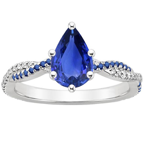 Bague solitaire poire avec saphir bleu et accents de diamants 3.75 carats - HarryChadEnt.FR