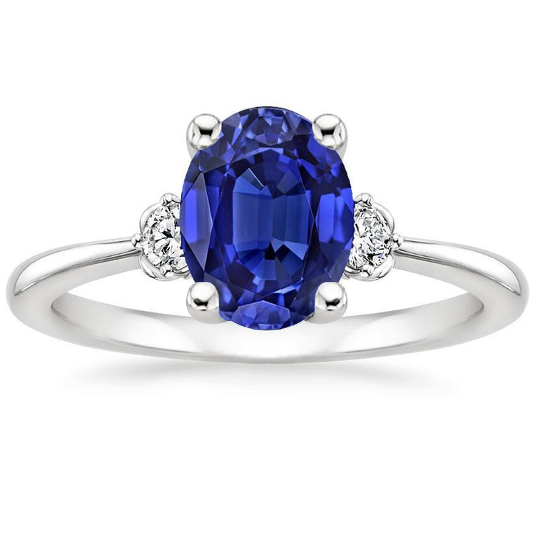 Bague trois pierres diamant et saphir de Ceylan ovale 3.50 carats or blanc - HarryChadEnt.FR