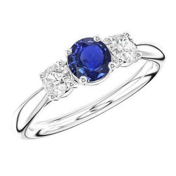 Bague trois pierres rondes en saphir bleu et diamant 1,50 carats