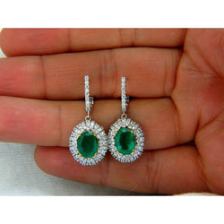 Boucle d'oreille ovale verte émeraude avec diamant 5.04 carats