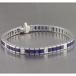 Bracelet Tennis Saphir Bleu Taille Princesse 25 Carats Or Blanc 14K