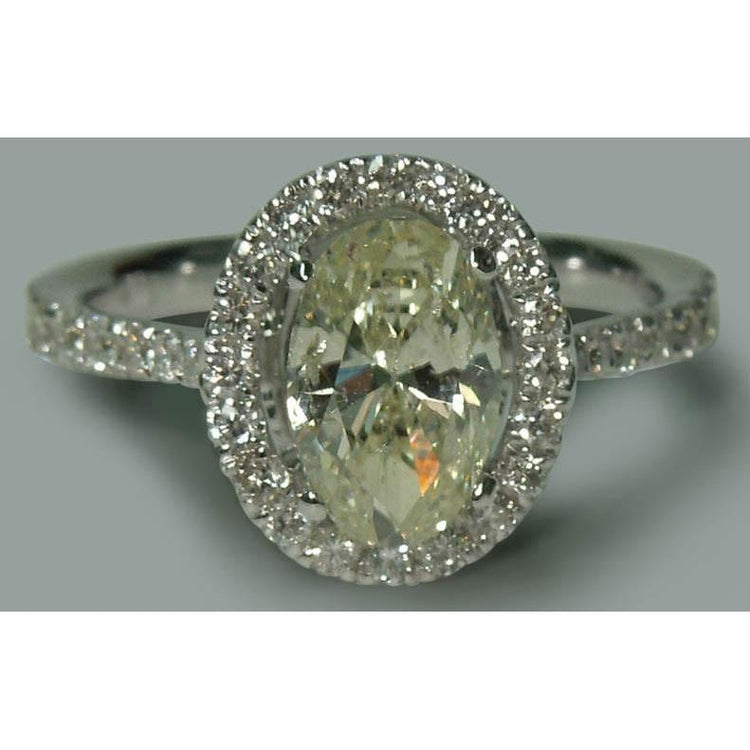 Solitaire Avec Accents 2.03 Ct. Bague de fiançailles de style halo ovale WG 14K - HarryChadEnt.FR